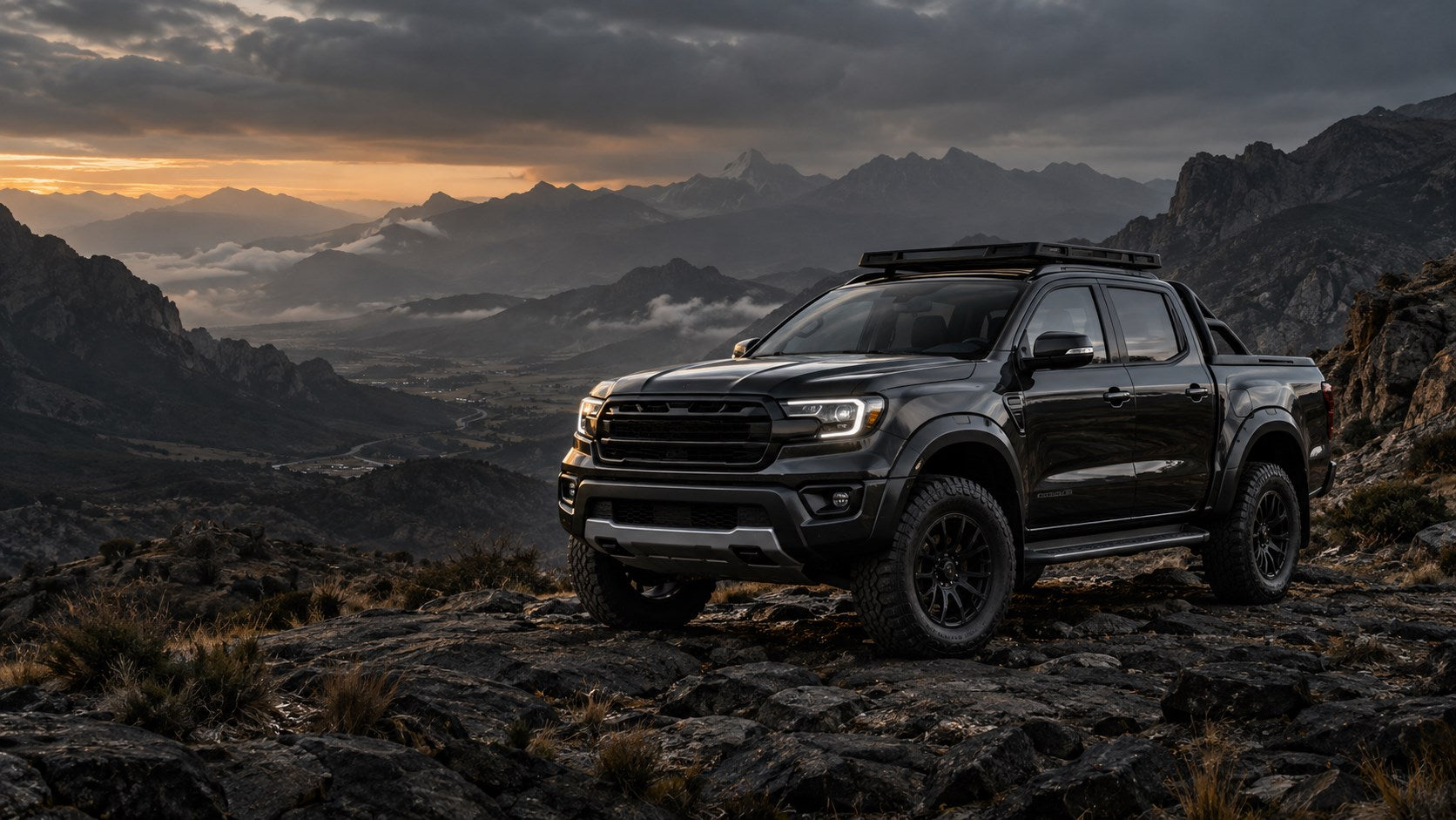 Graphite bakkie in a mountain landscape